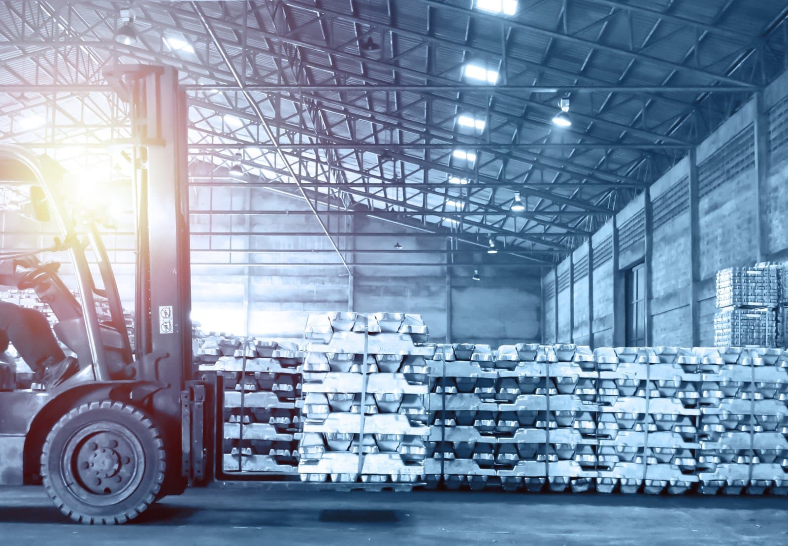 Wonder Industries warehouse, with palletised metal ingots in stock
